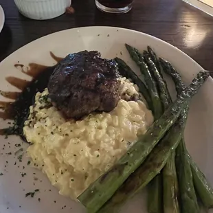 The risotto was delicious but steak was chewy and cooked way too much
