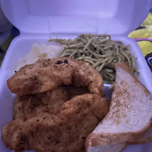 Fried chicken, green spaghetti, mashed potato and a slice of bread!