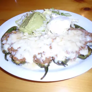Baked jalapenos &amp; ground beef appetizer.