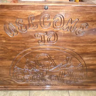 A cool carved wood front desk.