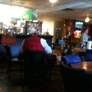 a man sitting at the bar