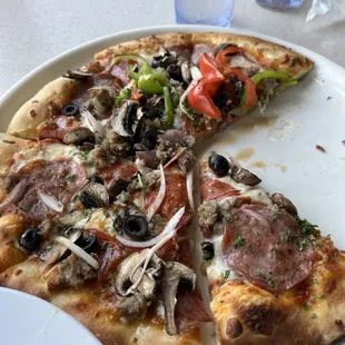 Thick crust pizza with all the toppings!  (Pleasure Point Pizza)