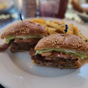 two burgers and french fries