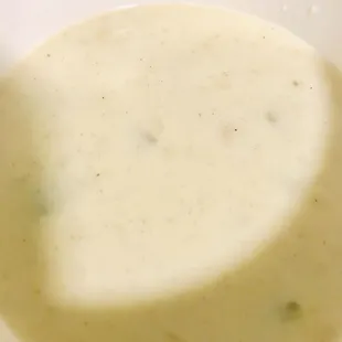 a bowl of soup with a spoon