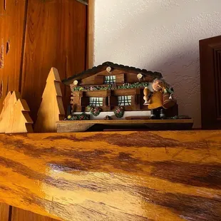 a log cabin with a christmas scene