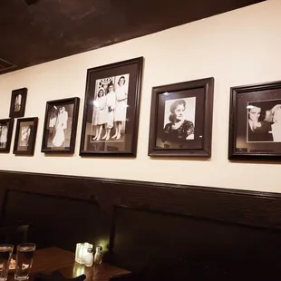 a wall of family photos