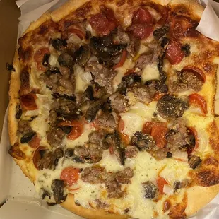 Super Pizza Super Pizza with white sauce on half