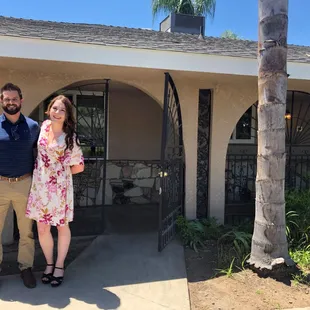 Arynne Broom &amp; Garrett McColl in front of our new house