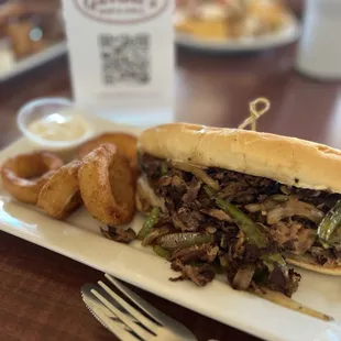 Philly with Onion rings (substituted from fries)