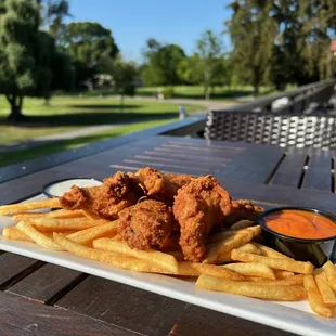 Wings and fries on the deck.