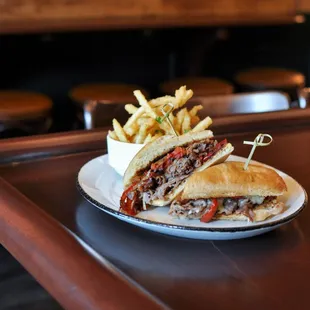 a sandwich and fries on a plate
