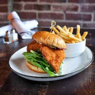 a fried fish sandwich and french fries