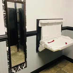 Full length mirror and baby changing table
