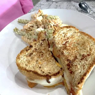 Ultimate Grilled Cheese sandwich - provolone, cheddar, applewood bacon, tomatoes, honey mustard, wheat bread with side of pasta salad