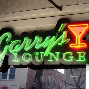 a neon sign for a bar