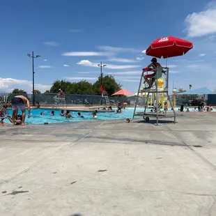 Rest of pool. Diving board and middle play ground