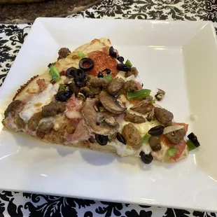 a slice of the deep crust, ultimate supreme pizza