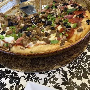 large, deep crust, ultimate supreme pizza