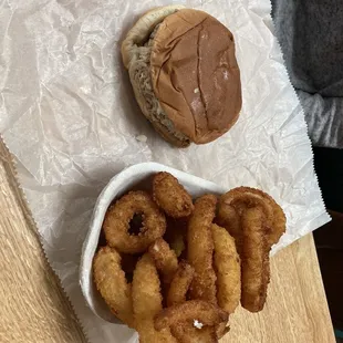 Chopped barbecue with a side of onion rings