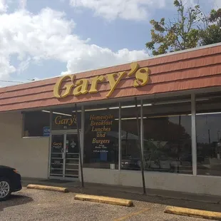 a car parked in front of the store