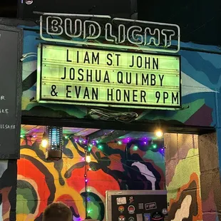 a neon sign for a bar