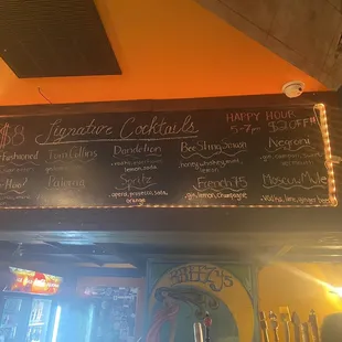 Above the indoor bar cocktail menu