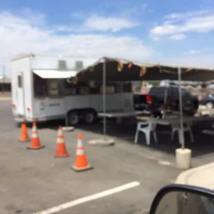 El Compa Taco truck is set up in parking lot