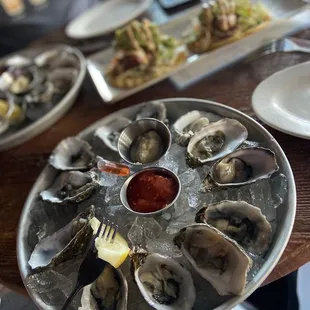 Happy hour oysters and grilled fish tacos