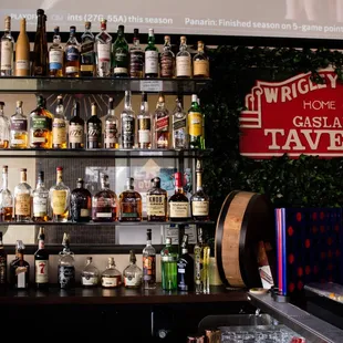 a shelf of liquor bottles