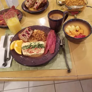 Description: Scrumptious breakfast at the Gaslight BnB in the Gaslight District of Cincinnati Cranberry orange breakfast loaf, turkey bacon,