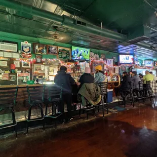 people sitting at the bar