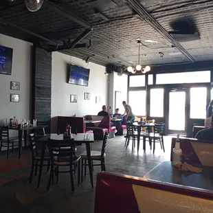 Dining area with pretty purple benches