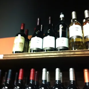  shelf of wine bottles