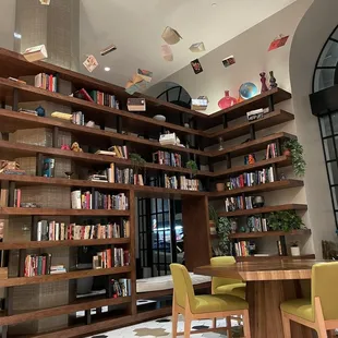 Street side, by the entrance of hotel! Books are flying ! Great design.