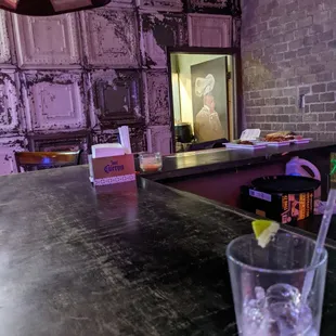 a glass of water on the bar