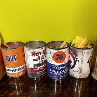 a variety of cans on a table