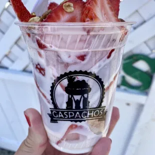 Strawberries and cream topped with granola