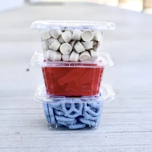 three containers of food