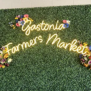 a sign that says gastonia farmers market