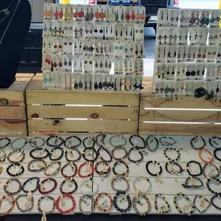 Wild And Whimsy Living. We specialize in hand crafted jewelry.  Earrings, bracelets, necklaces and more.