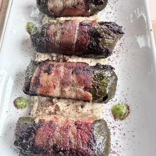 Bacon wrapped dolmades.