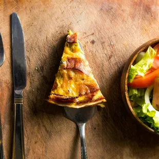 At Gastronomix, enjoy traditional Quiche Lorraine, specials like salmon-goat cheese, and classic spinach. Vegetarian and gluten-free options