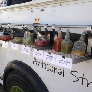 a variety of condiments for sale