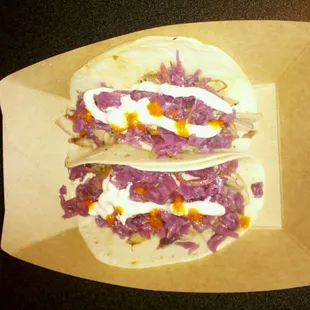 Chicken tacos with habanero hot sauce.