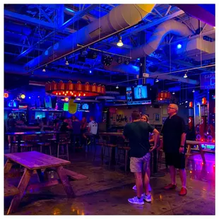 a group of people in a bar