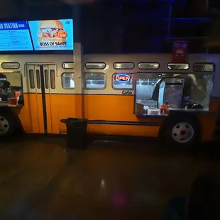 a man standing in front of a bus