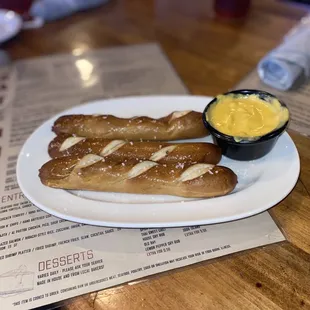 Baked pretzel sticks with beer cheese.