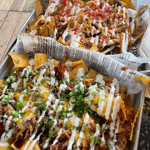 BBQ carnitas nachos and chipotle chicken nachos