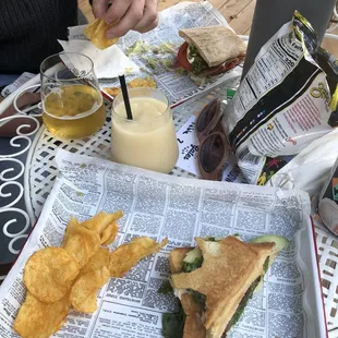 Italian Job &amp; French Connection sandwiches. Zapps potato chips. Sour Weis beer (can&apos;t remember the name) and pins colada frozen cocktail.