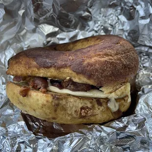 a sandwich wrapped in tin foil